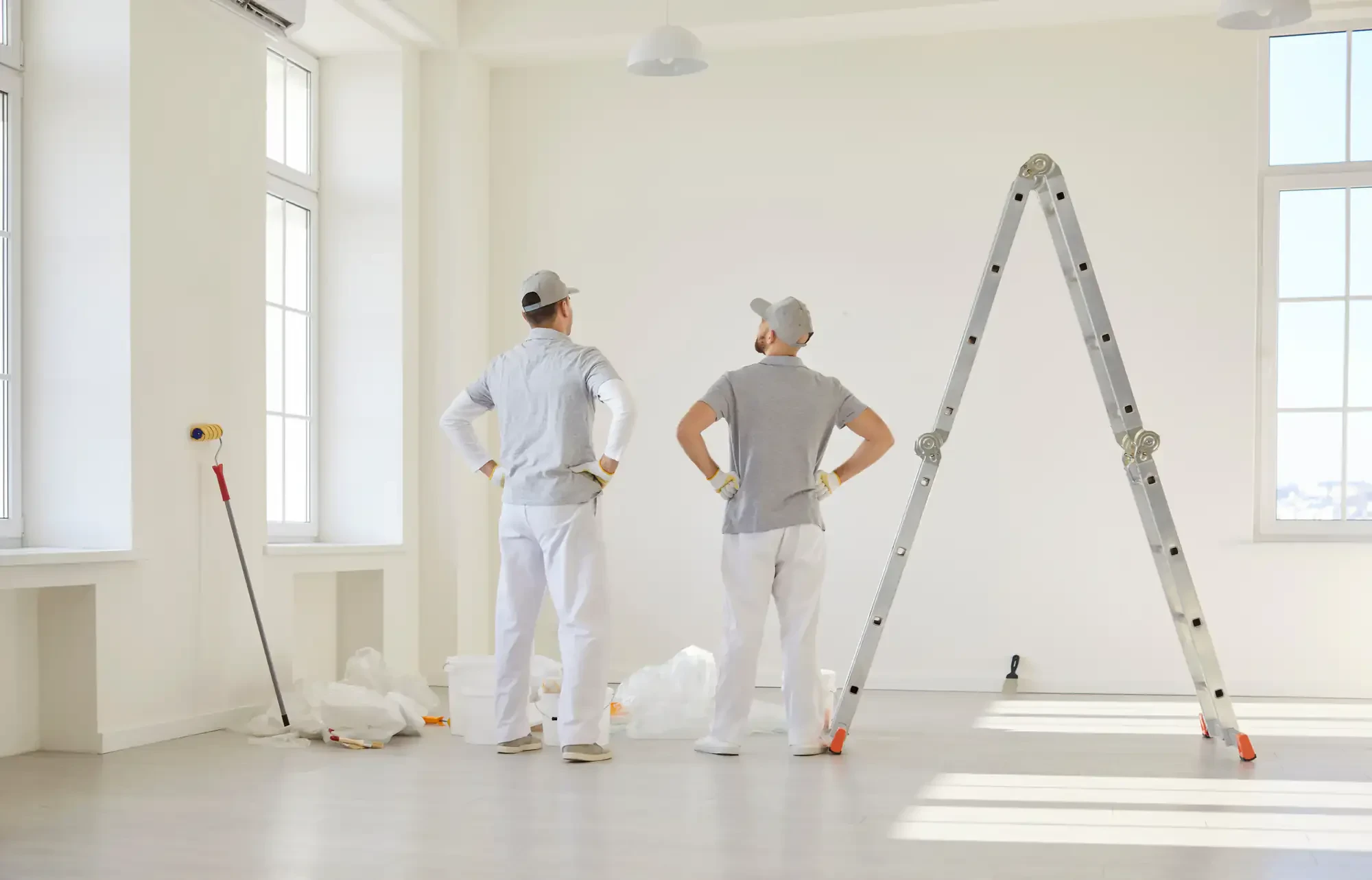 Professional painters inspecting empty room essex county massachusetts service provided in Essex, Massachusetts with quality workmanship and attention to detail.