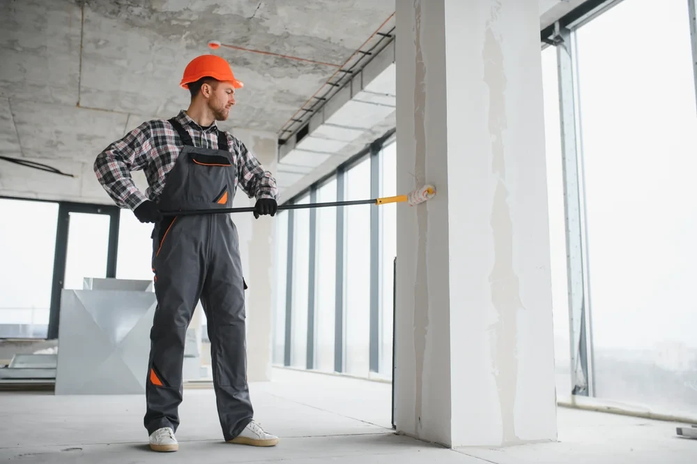Professional worker painting construction site essex county massachusetts service provided in Essex, Massachusetts with quality workmanship and attention to detail.