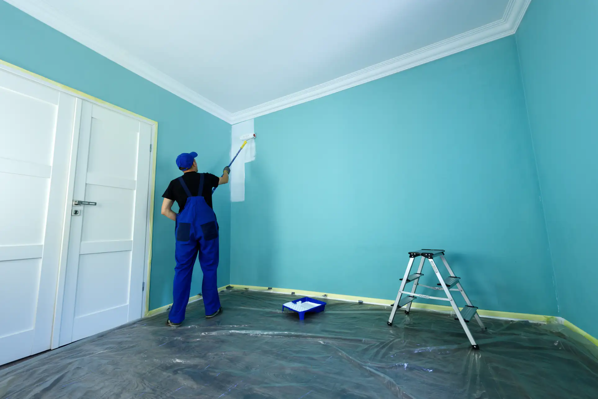 Expert blue wall painting by Fine Coat Painters in Essex County, Massachusetts, showcasing precision and high-quality finish for residential interiors